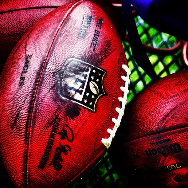 Breaking in footballs on Week 2 of OTAs.