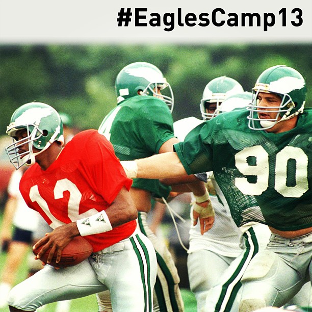 Training Camp 1988: rookie (and @espn's) Mike Golic plays tag with QB Randall Cunningham.