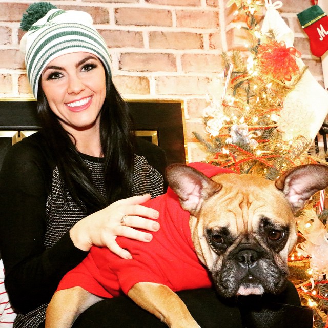 Our Stephanie shares some holiday cheer with her puppy pal.